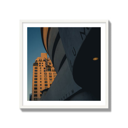 Fine art photograph of the Guggenheim Museum at dusk, archival pigment print, collector size, white frame.