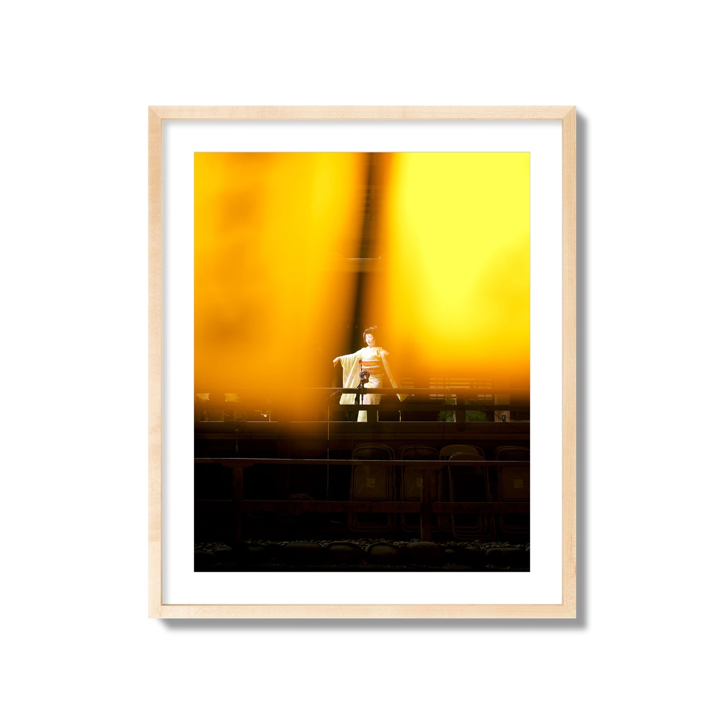 Fine art photograph of a geisha dancing, photographed through yellow lanterns, archival pigment print, giant size, natural wood frame.