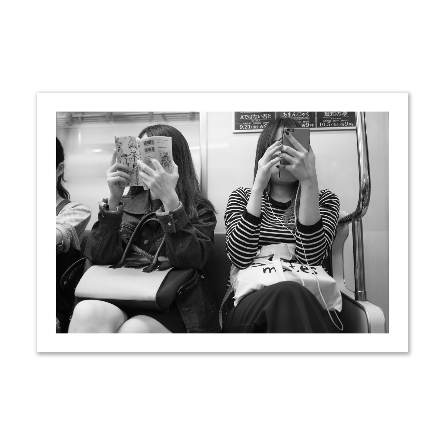 Black and white fine art photograph of two women on the Tokyo Metro, archival pigment print, collector size, unframed
