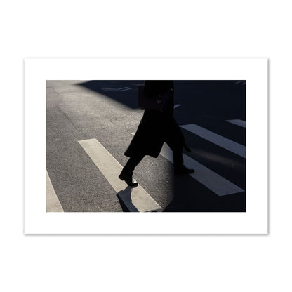 Fine art street photograph of a woman walking through a crosswalk in Soho New York, archival pigment print, large size, unframed
