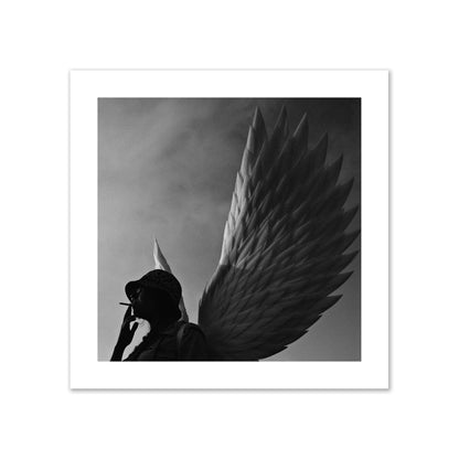 Fine art photography of a woman smoking in front of a winged statue, archival pigment print, collector size, print.