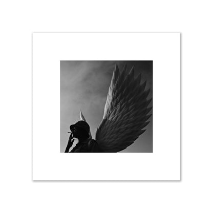 Fine art photography of a woman smoking in front of a winged statue, archival pigment print, medium size, print.